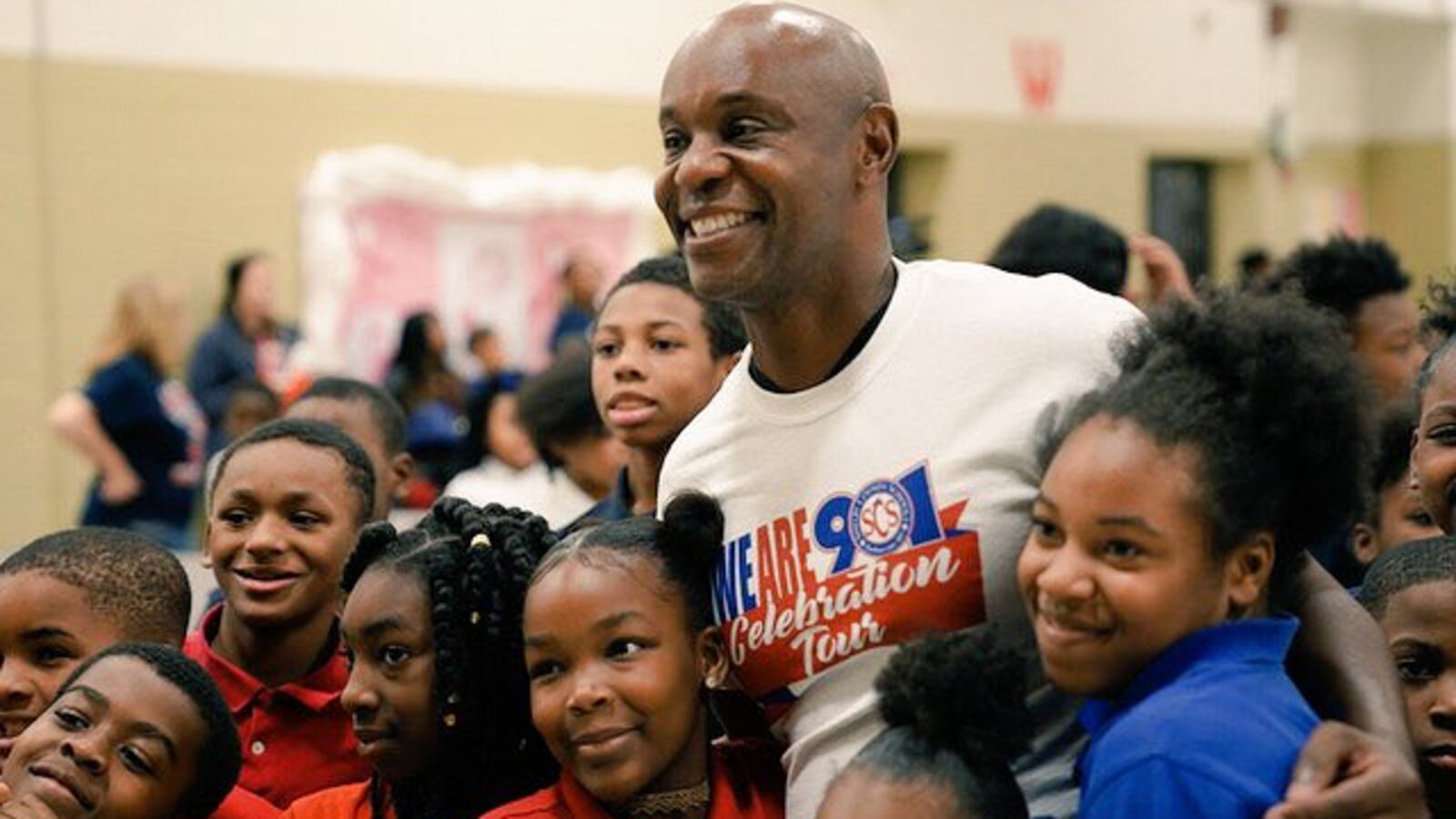 Superintendent Dorsey Hopson with students at A.B. Hill Elementary School in Memphis celebrating academic progress.