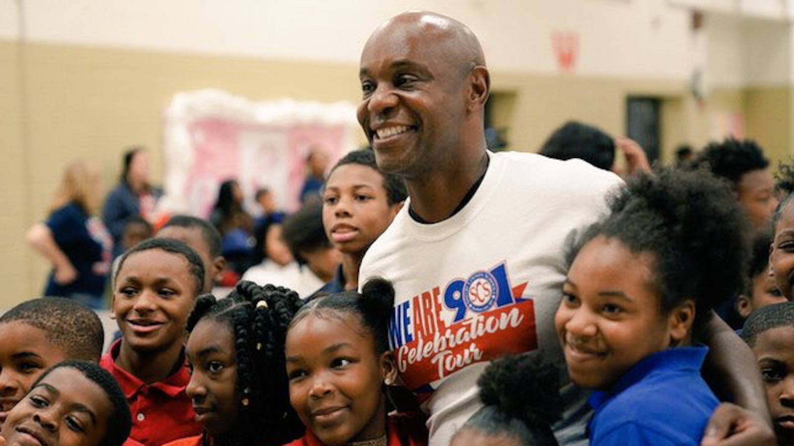Superintendent Dorsey Hopson with students at A.B. Hill Elementary School in Memphis celebrating academic progress.