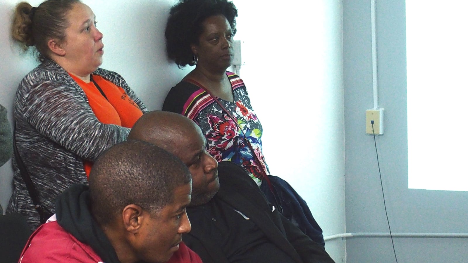Corey Johnson, seated right, is the executive director of Memphis Academy of Health Sciences.