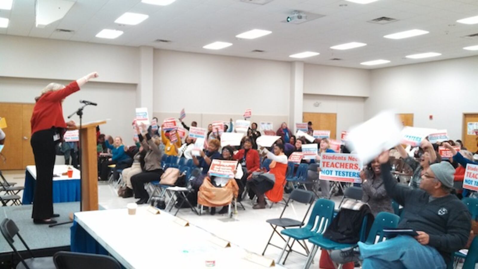 Shelby County School teachers rally against using TVAAS in teacher licensure Tuesday night at the local association building.