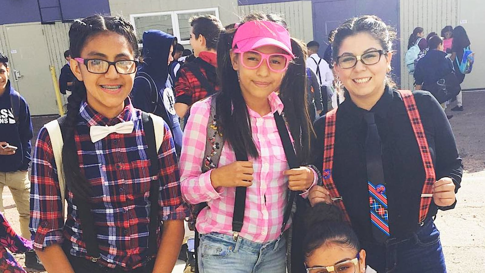 Teacher Natalie Mejia, right, with students from Atlas Preparatory School on "Nerds Rule the World" day last fall.
