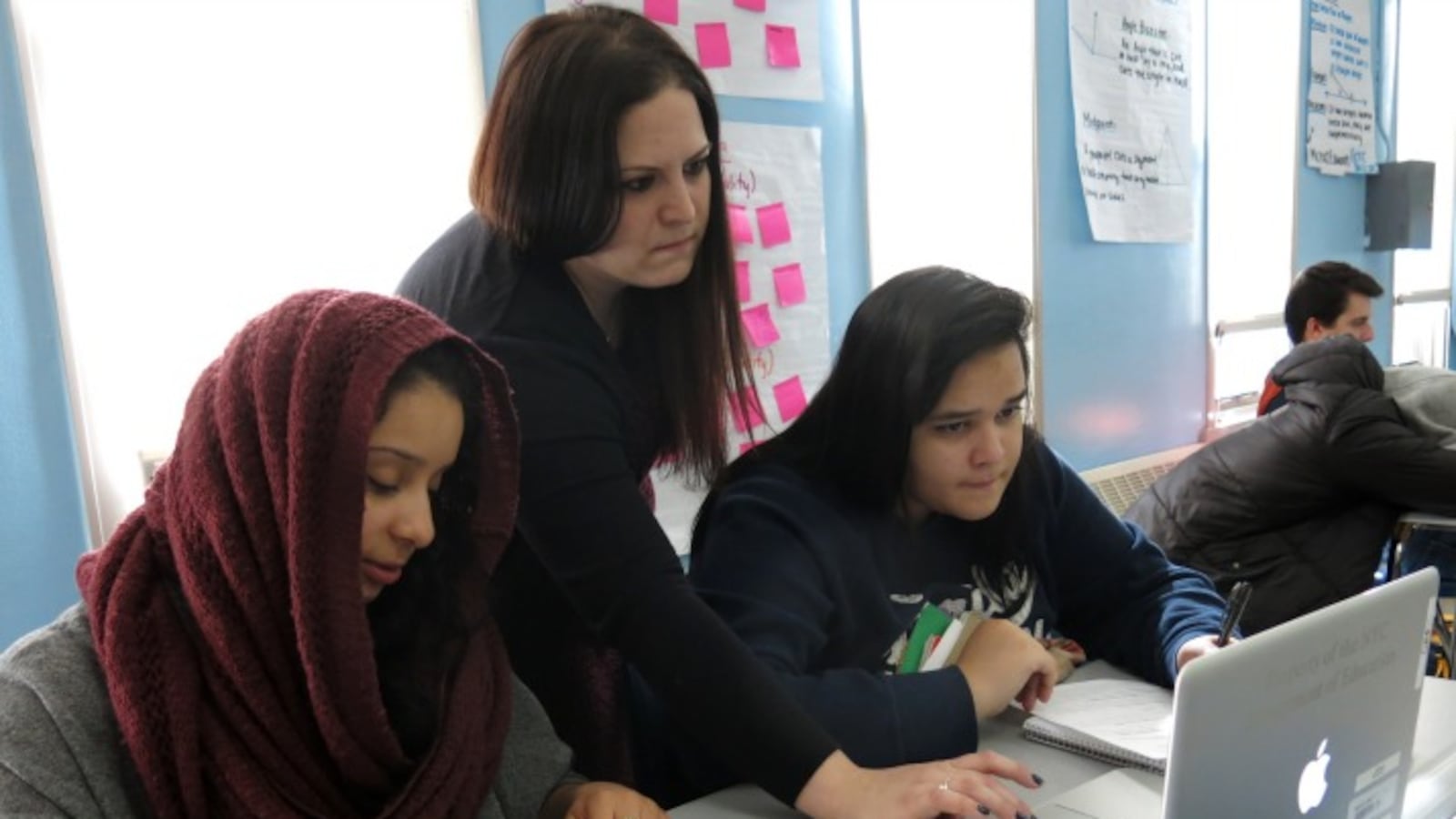 Teacher Marisa Laks, center, works with students in 2014 ahead of a Regents exam the following week.