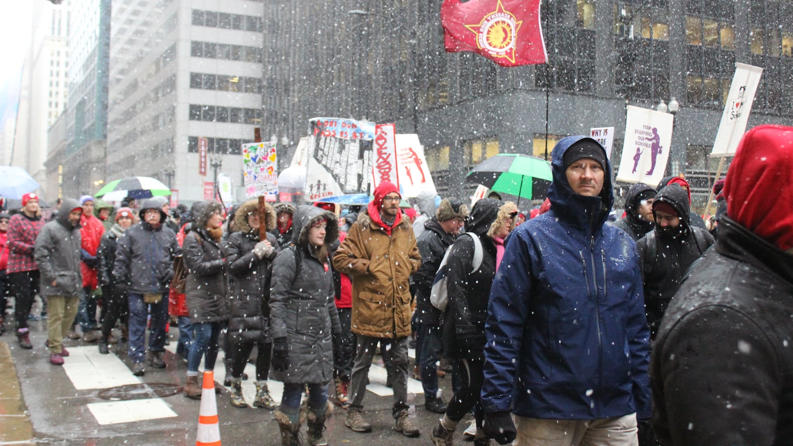Protesters with the Chicago Teachers Union march in downtown Chicago on Oct. 31, 2019, to press for a contract.
