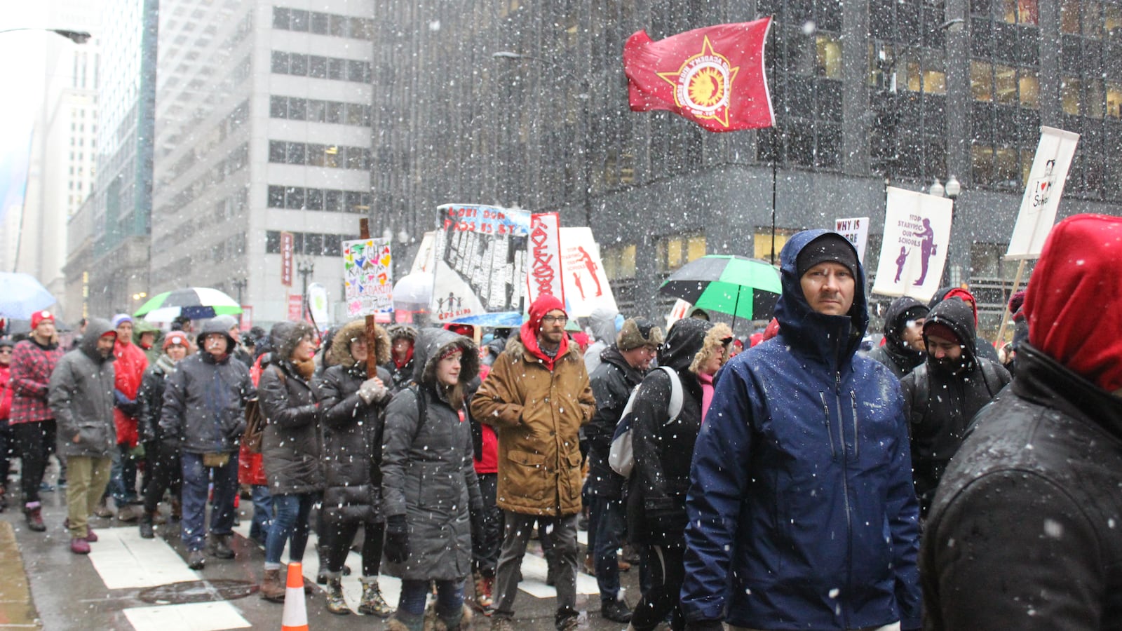 Protesters with the Chicago Teachers Union march in downtown Chicago on Oct. 31, 2019, to press for a contract.