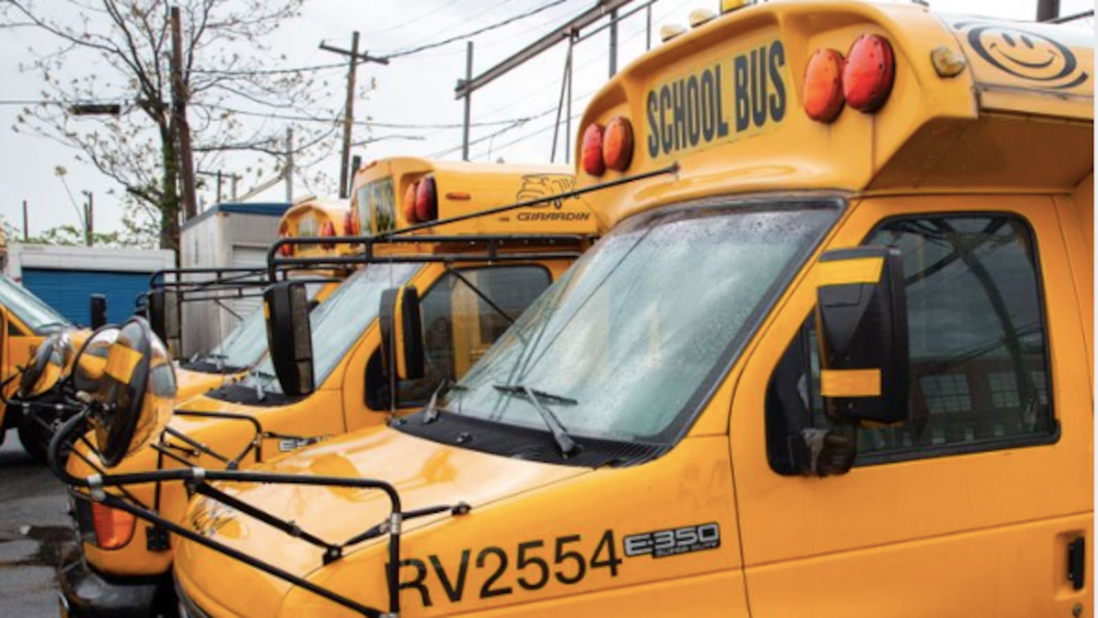Yellow school buses parked in a Brooklyn depot in April.