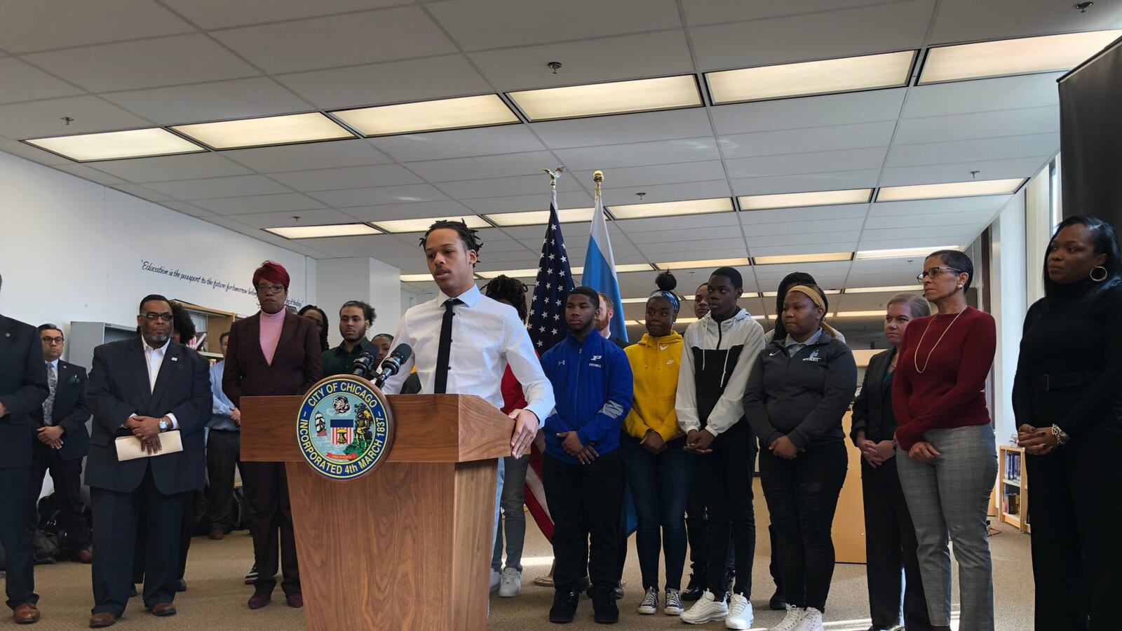 Malik Hicks speaks at a press conference on Friday about Chicago's new violence prevention program.