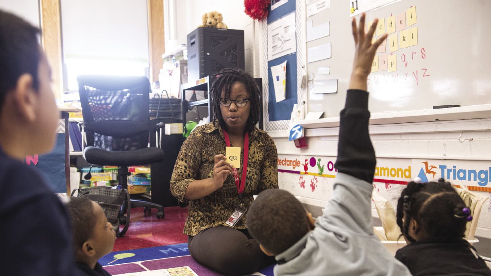 A teacher is shown with her students during class in Philadelphia.