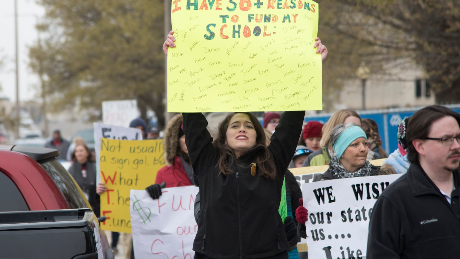 An Oklahoma teacher walks the picket line on April 2 in Oklahoma City, Oklahoma. Thousands of teachers and supporters are scheduled to rally Monday at the state Capitol calling for higher wages and better school funding. (Photo by J Pat Carter/Getty Images)