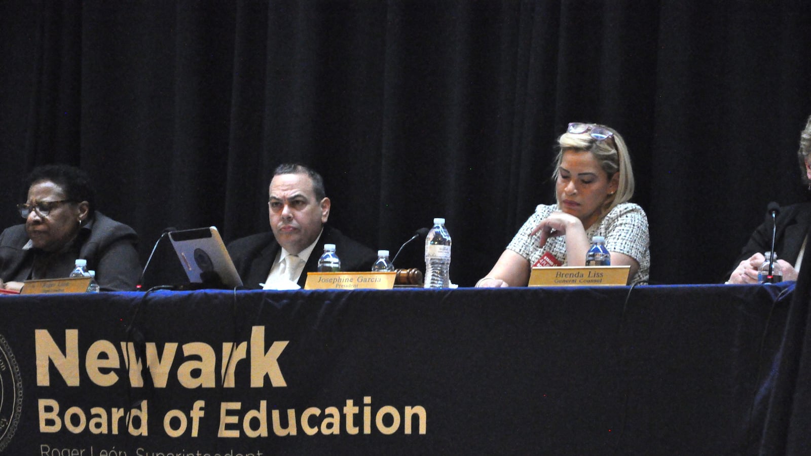 Newark Superintendent Roger León listened as charter school advocates and critics voiced their opinions at the board meeting.
