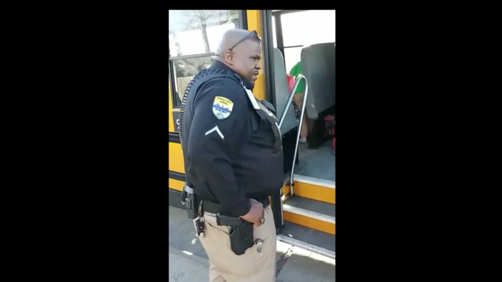 A screenshot from the mother's video shows a Denver Public Schools campus safety officer on the scene.