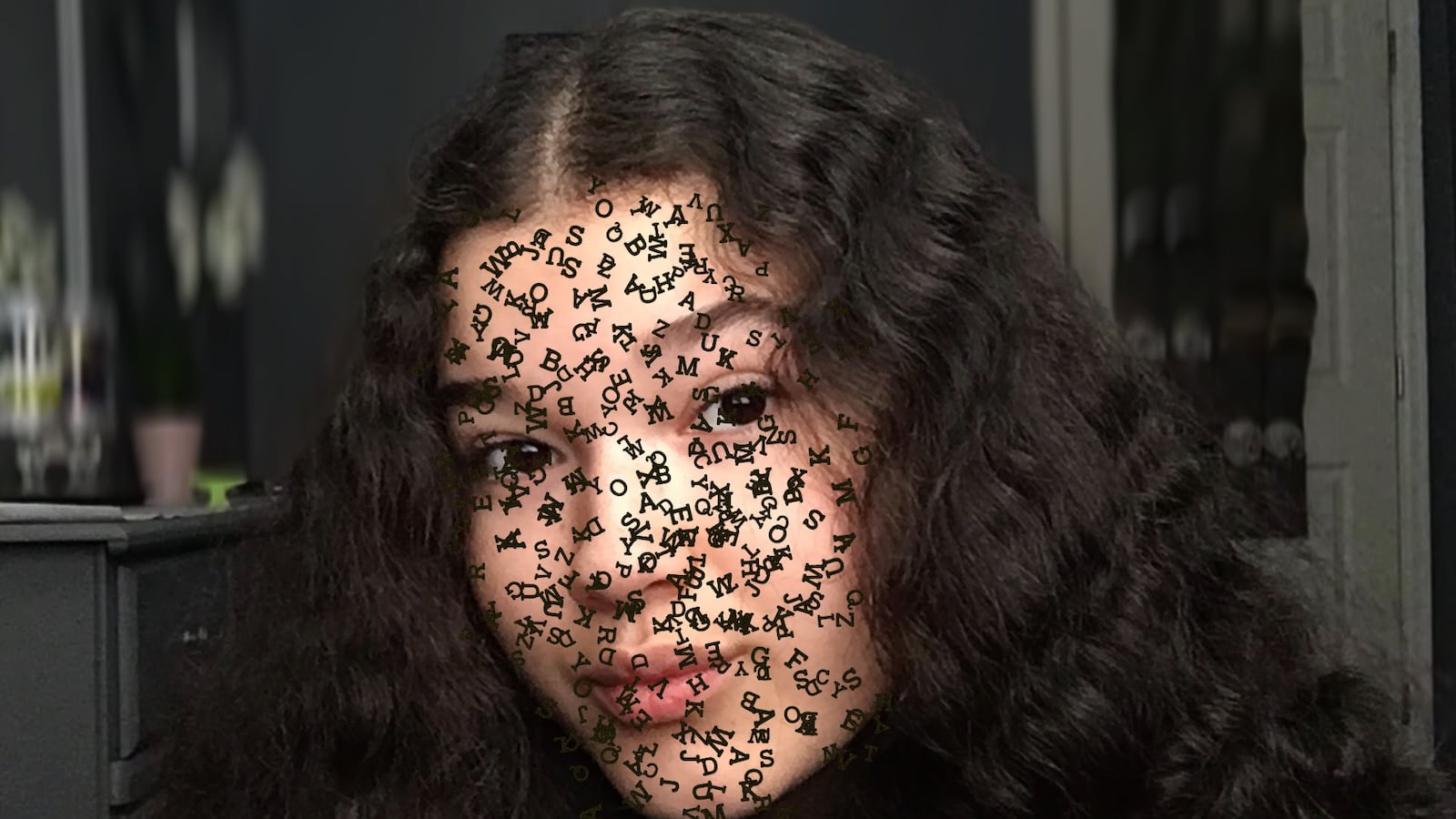 A self portrait of Casandra Sotelo-Rivera with tiny black lettering over her face.