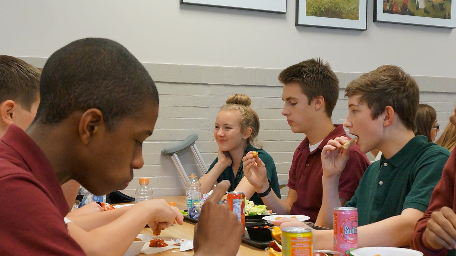 Students eat lunch at the Oaks Academy Middle School, a private Christian school in Indiana that is integrated by design and accepts taxpayer funded vouchers.