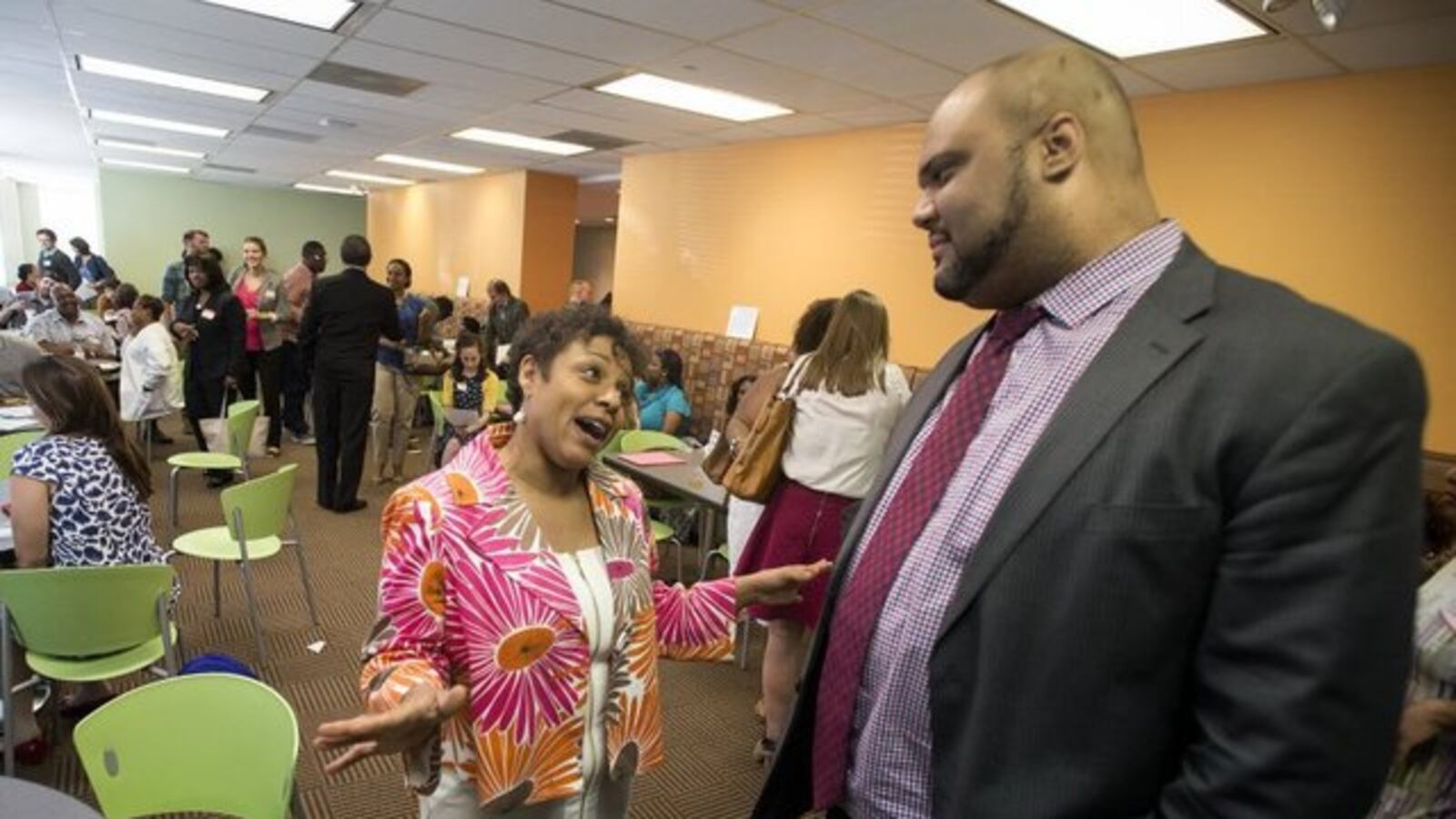 Tim Ware, who leads the state-run Achievement Schools in Memphis, talks with Whitney Achievement Elementary School Principal Debra Broughton during a 2015 meeting.