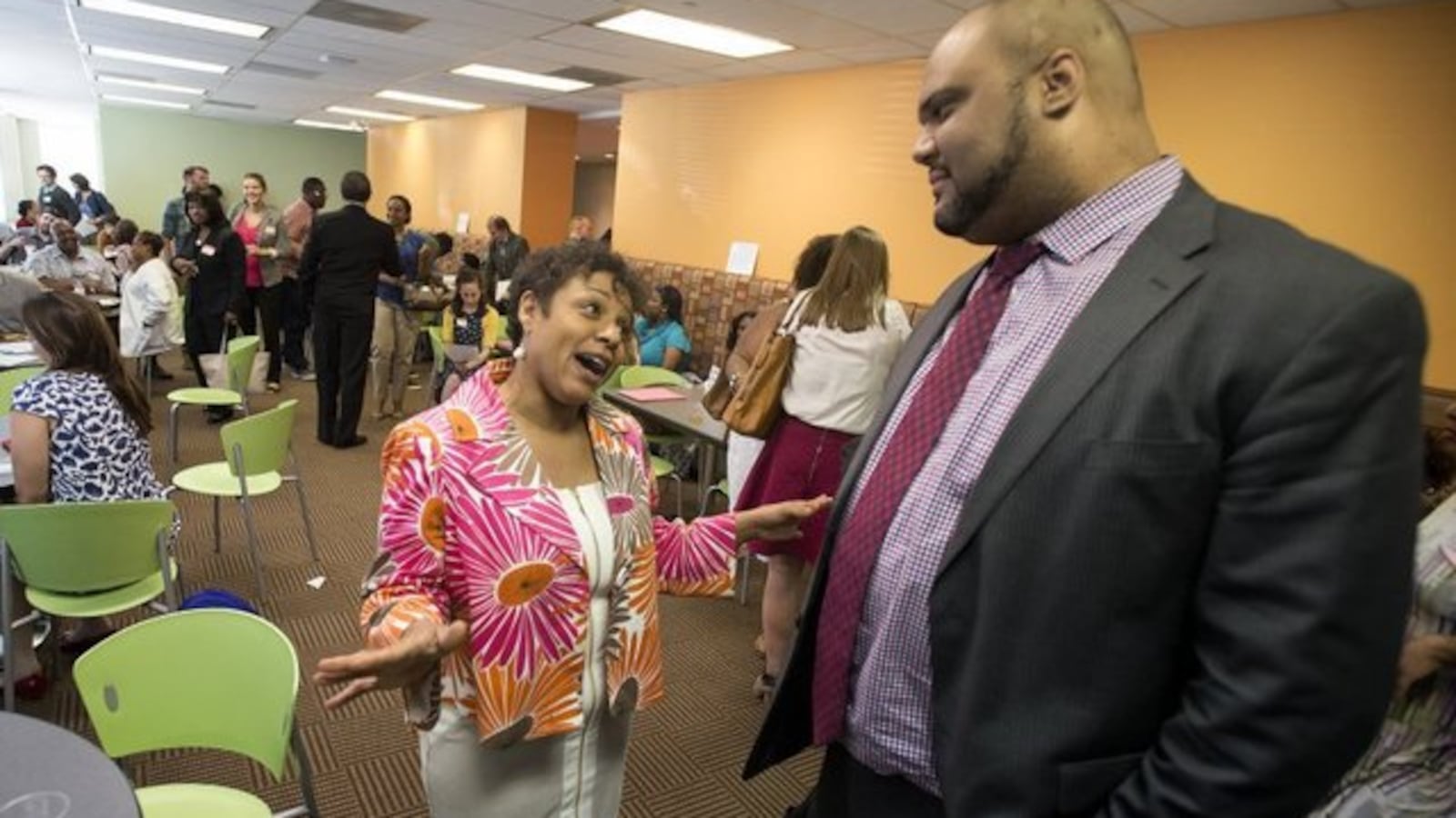 Tim Ware, who leads the state-run Achievement Schools in Memphis, talks with Whitney Achievement Elementary School Principal Debra Broughton during a 2015 meeting.
