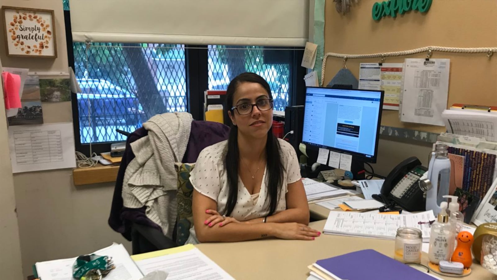 College counselor Anna Karabelas sits in her office at Queens Technical High School, where she exposes students to the college application process.