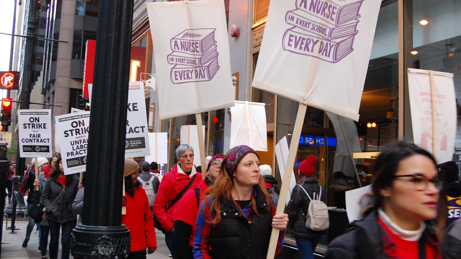 School nurses and their supporters picketed in downtown Chicago on the first day of the teachers strike, Oct. 17, 2019.