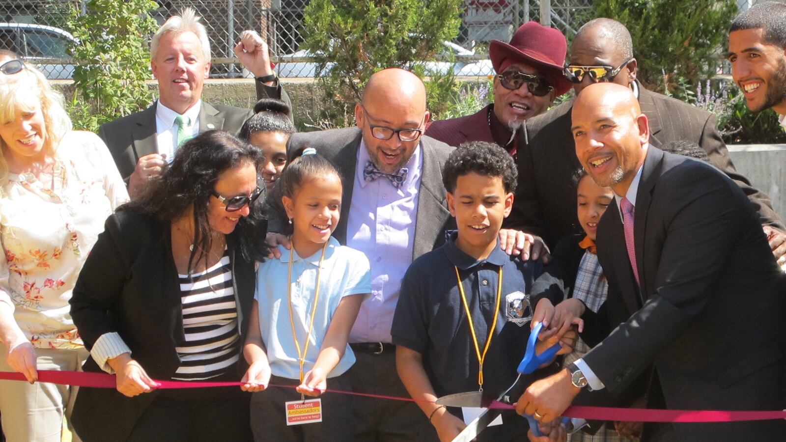 Chancellor Betty Rosa and Bronx Borough President Ruben Diaz Jr. cut the ribbon for a new playground at P.S. 55/Success Academy Bronx 2.