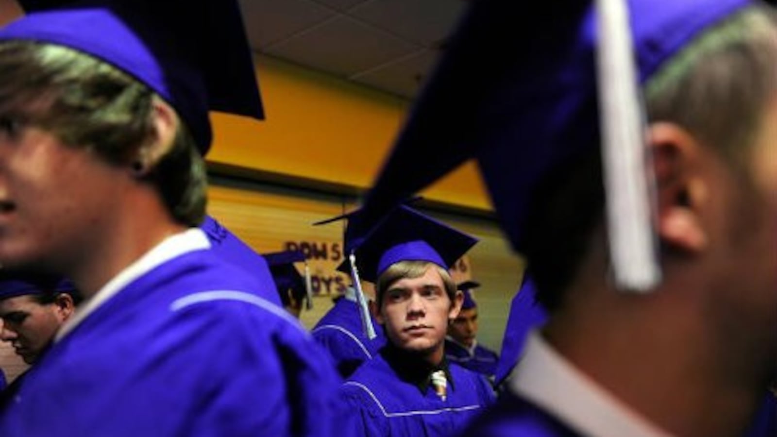 Arvada West High School seniors prepare for graduation in 2013 ( (Seth McConnell, Denver Post ).