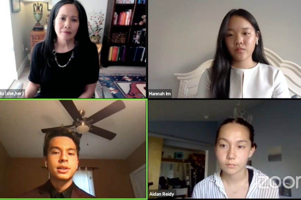 A screenshot of a Zoom meeting showing one adult and three high school students testifying during a school board meeting.