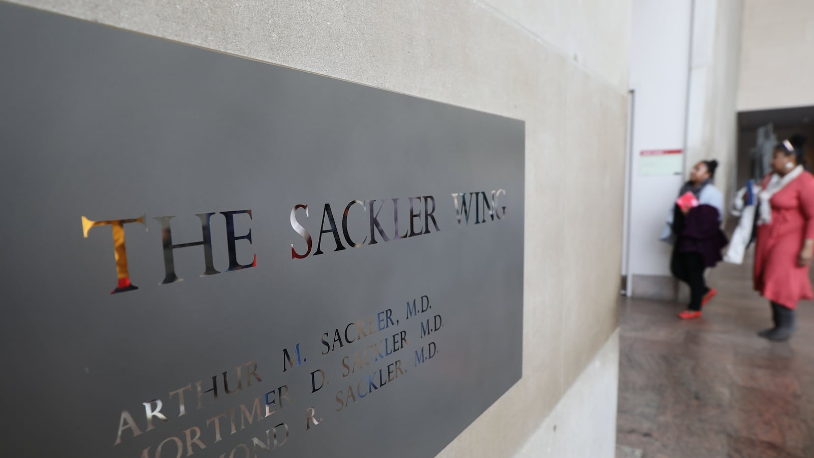 NEW YORK, NEW YORK - A sign welcomes visitors to the Sackler Wing at the Metropolitan Museum of Art in New York City. (Photo by Spencer Platt/Getty Images)