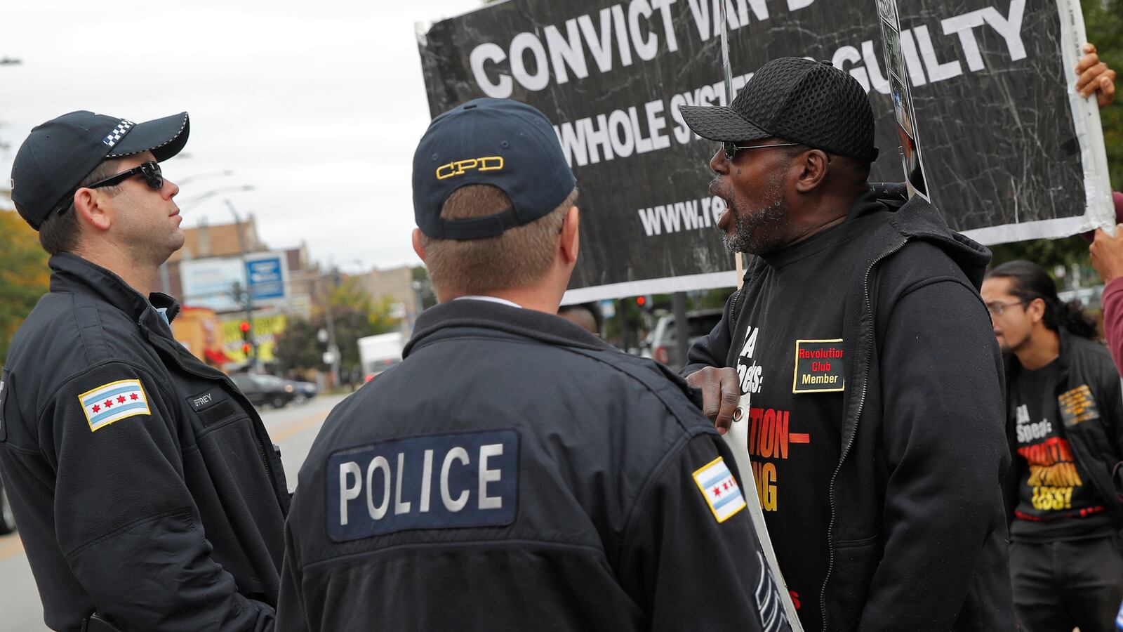 The day before the verdict was read, protesters demonstrated in front of a line of Chicago police officers outside the Leighton Criminal Court Building in Chicago. Chicago police officer Jason Van Dyke was convicted of second-degree murder and aggravated battery.