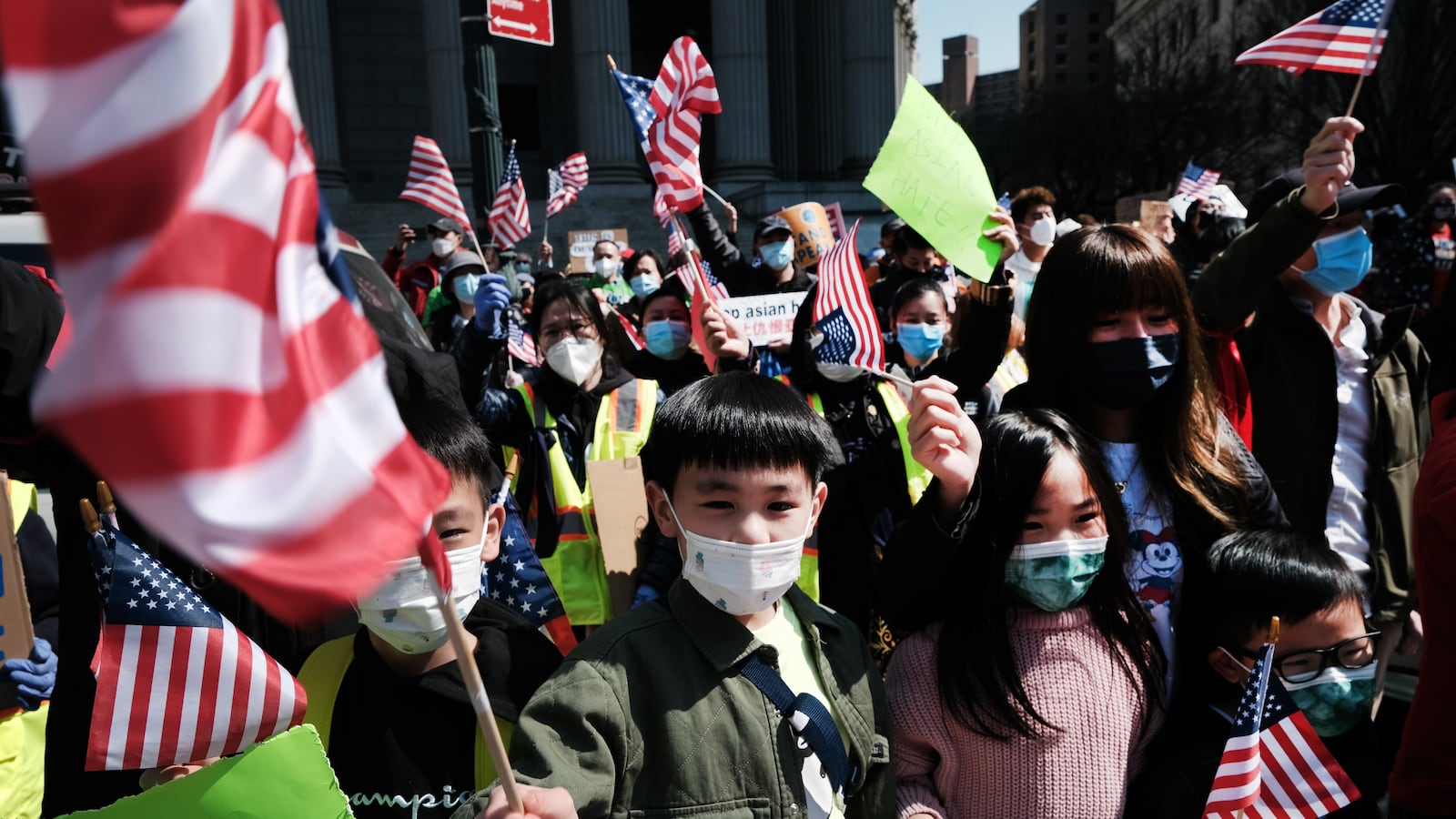 NEW YORK, NEW YORK - APRIL 04: People participate in a protest to demand an end to anti-Asian violence on April 04, 2021 in New York City. The group, which numbered near 3000 and was made up of activists, residents and local politicians, marched across the Brooklyn Bridge. After a rise in hate crimes against Asians across the U.S. and in New York City, groups are speaking up and demanding more attention to the issue. (Photo by Spencer Platt/Getty Images)