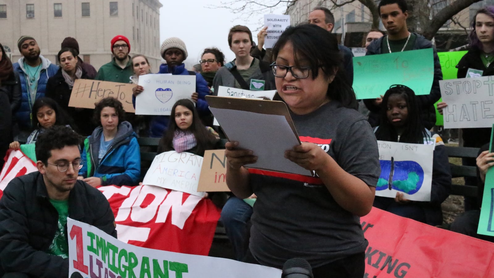 Diana Eusebio, an advocate with New York State Leadership Council, speaks at a rally asking the Department of Education to do more for immigrant students.