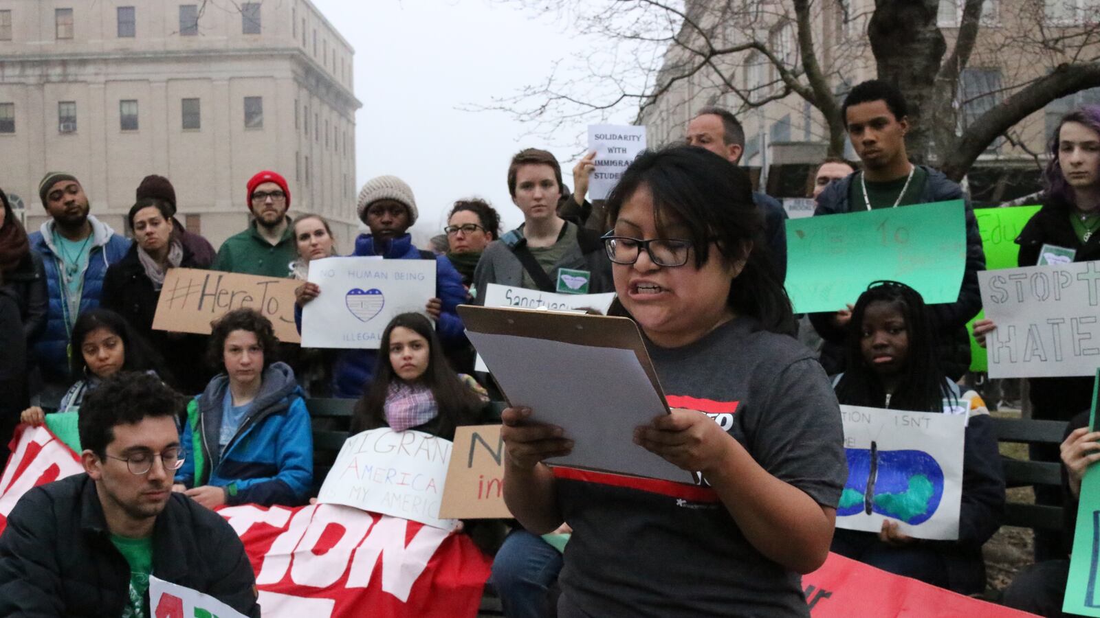 Diana Eusebio, an advocate with New York State Leadership Council, speaks at a rally asking the Department of Education to do more for immigrant students.