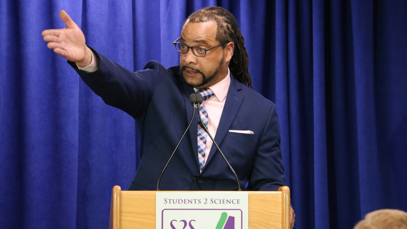 A. Robert Gregory at the unveiling of a new science-education center this month.
