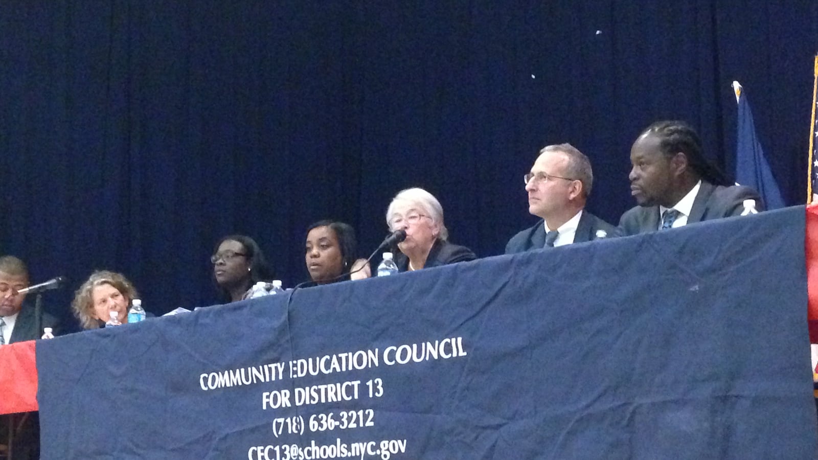 Chancellor Carmen Fariña speaks at a town hall meeting with parents of District 13, where she briefly discussed the new role that superintendents will play.