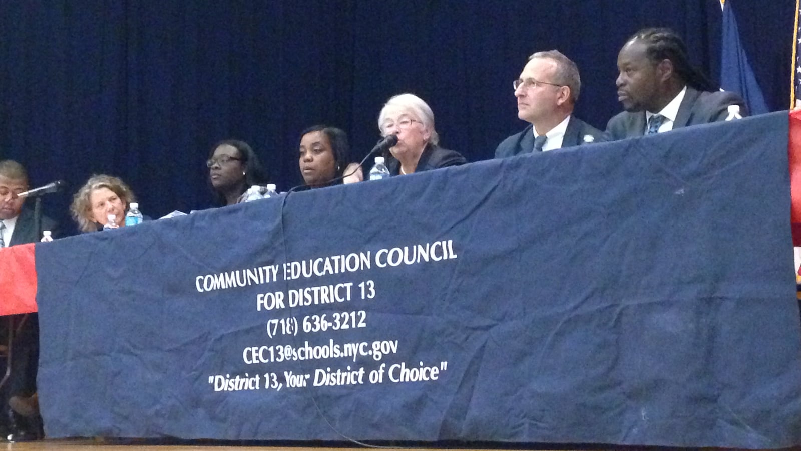Chancellor Carmen Fariña speaks at a town hall meeting with parents of District 13, where she briefly discussed the new role that superintendents will play.