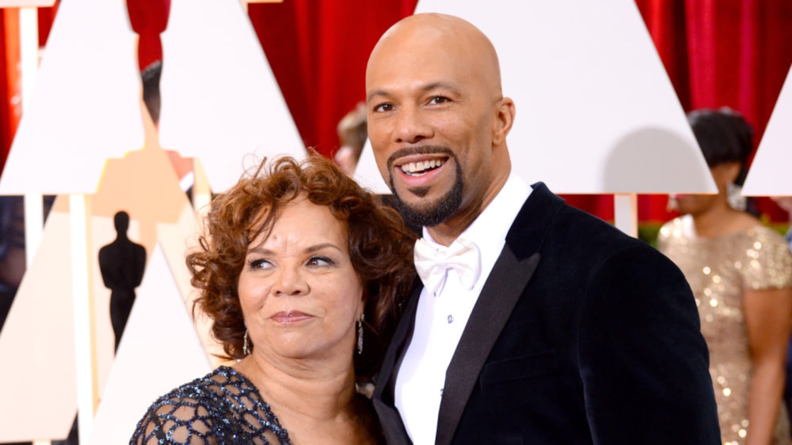 Chicago hip-hop artist Common and mother Mahalia Hines at the 87th Annual Academy Awards