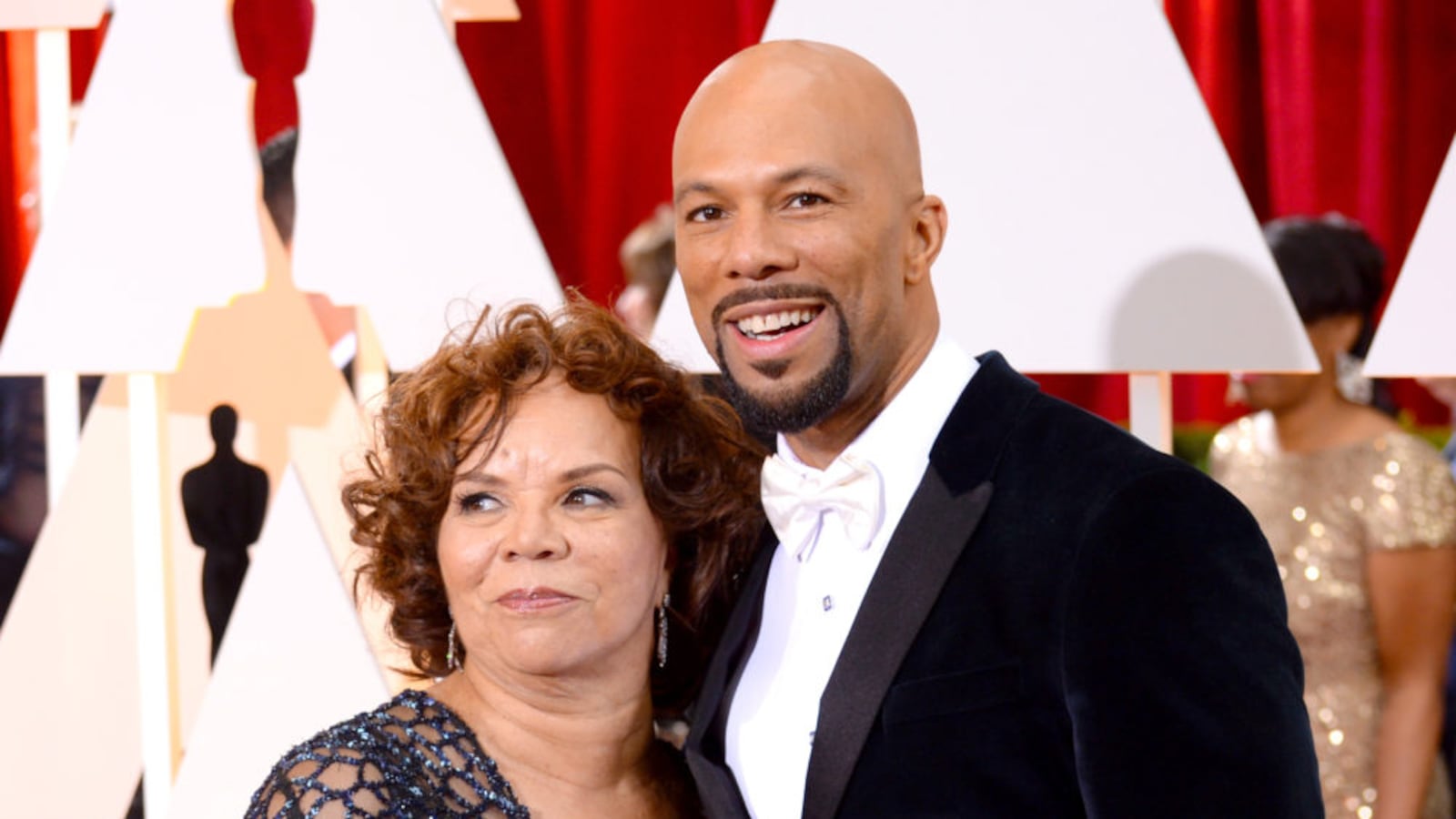 Chicago hip-hop artist Common and mother Mahalia Hines at the 87th Annual Academy Awards