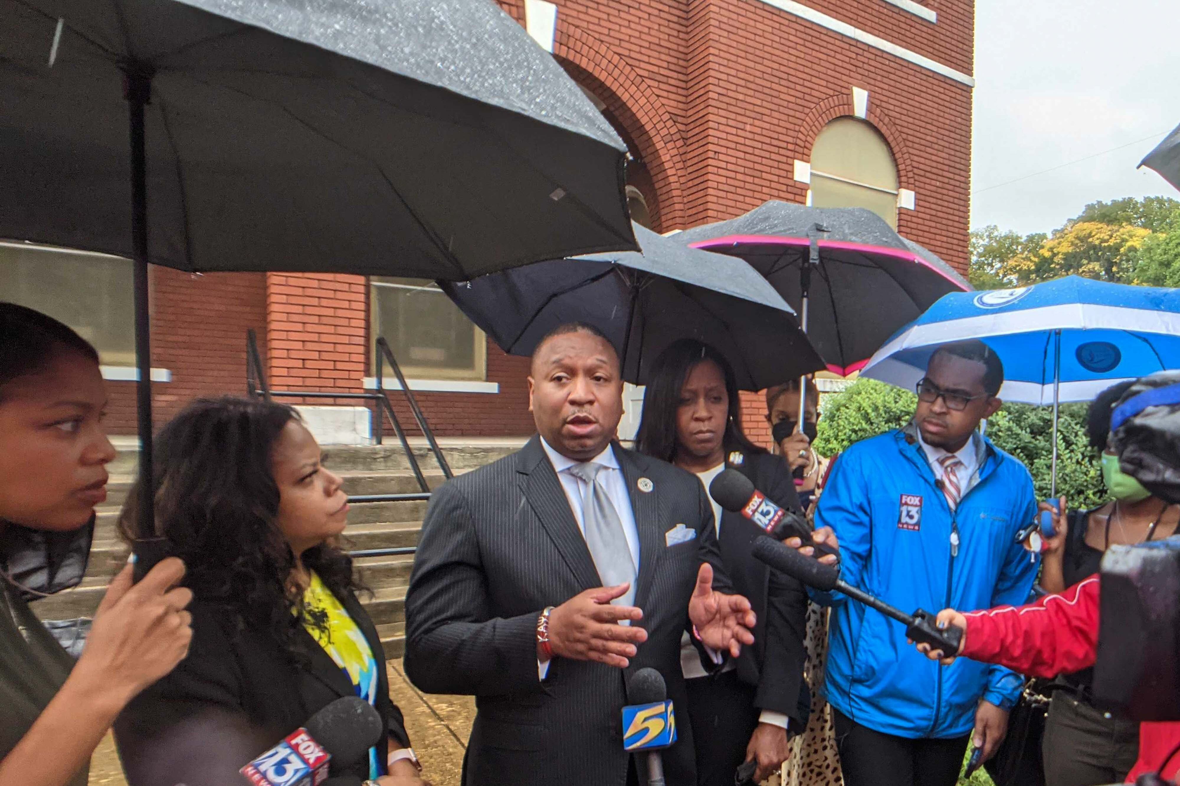 Shelby County Schools Superintendent Joris Ray speaks with members of the press outside of Metropolitan Baptist Church.