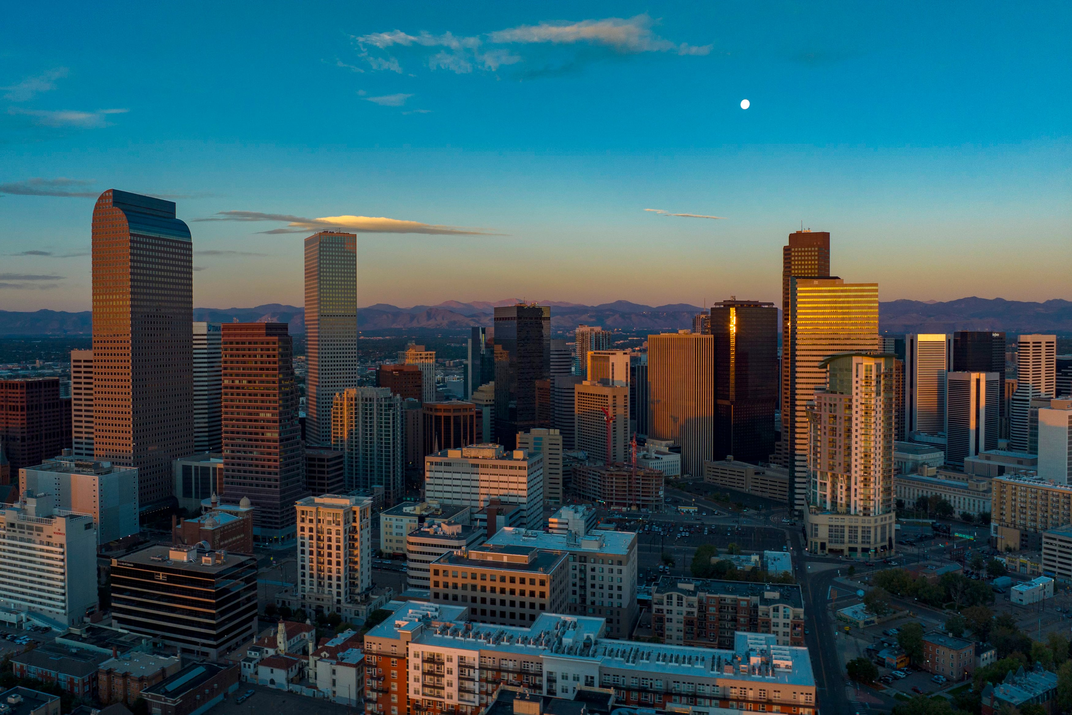 sunset on Denver skyline looking west towards Rocky Mountains