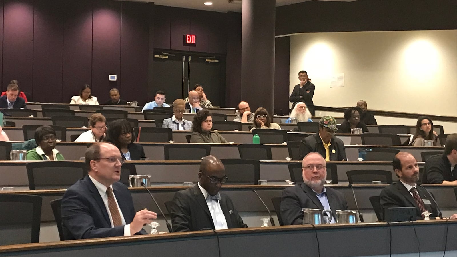 Eric Lupher of the Citizen Research Council of Michigan, Benjamin Edmondson of Ypsilanti Community Schools, Randall Davis of Albion-Marshall School District and Scott Menzel of Washtenaw County Intermediate School District testify before the Michigan Civil Rights Commission