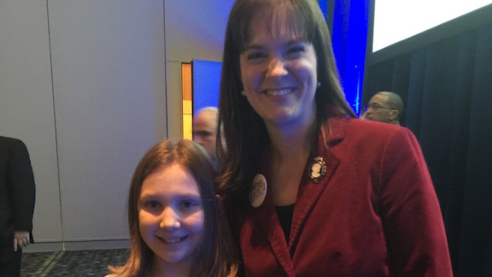 Fourth-grader Ryann Smith meets Education Commissioner Candice McQueen at a statewide literacy event, where she also hand-delivered a letter about dyslexia (below) to Gov. Bill Haslam.