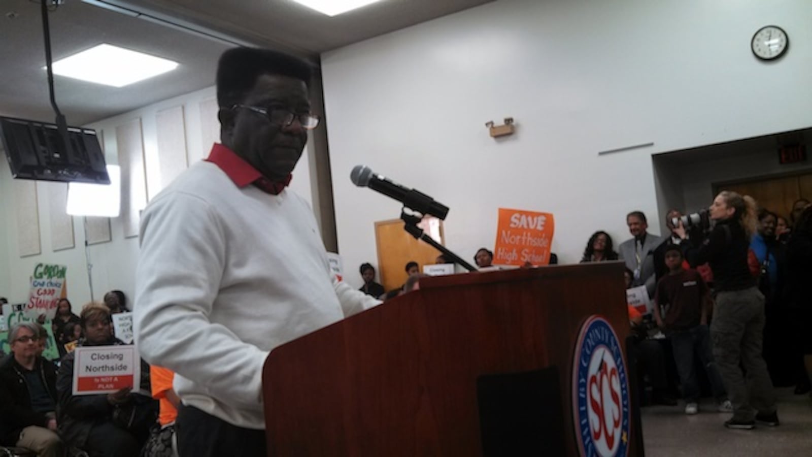 M-SCEA President Keith Williams voices opposition to school closures earlier this year during a board meeting.