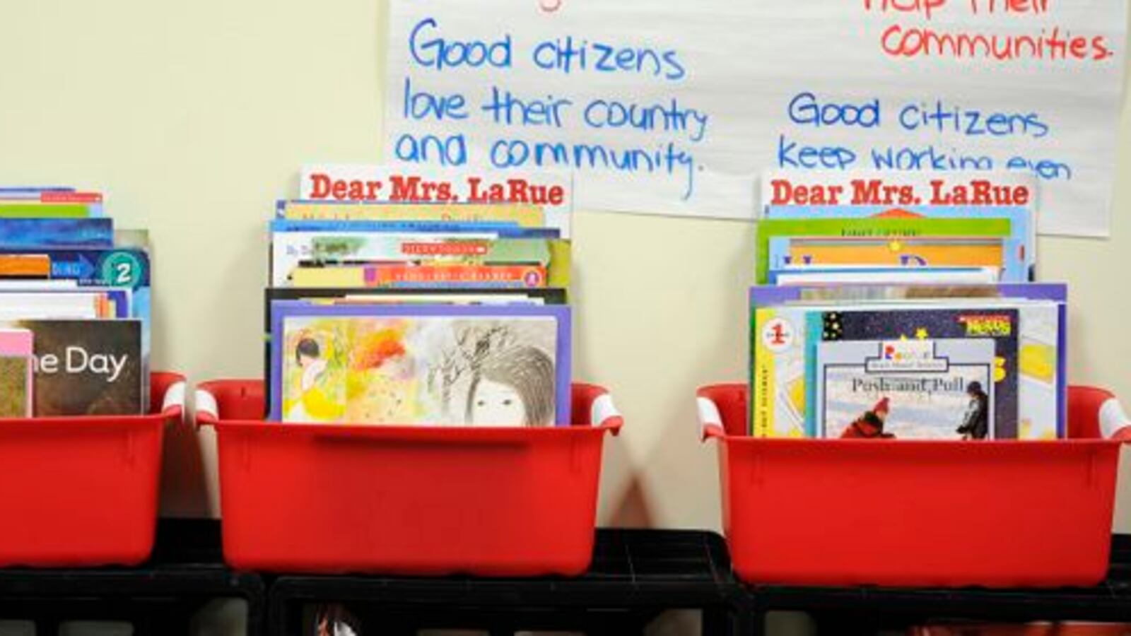 A fourth-grader at Aurora's AXL Academy weaves his bike through cones during the school's bike rodeo to promote biking to school safely.
