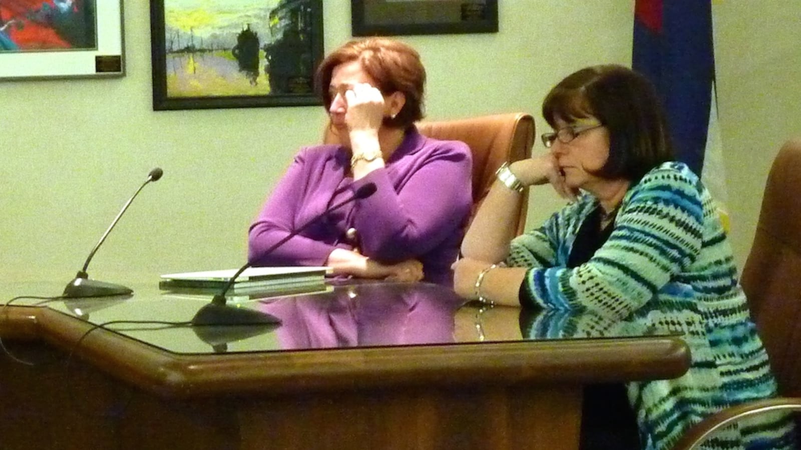 Members of the Jeffco Public Schools board minority Lesley Dahlkemper, left, and Jill Fellman moments before they voted against naming Daniel McMinimee as the districts sole finalist.