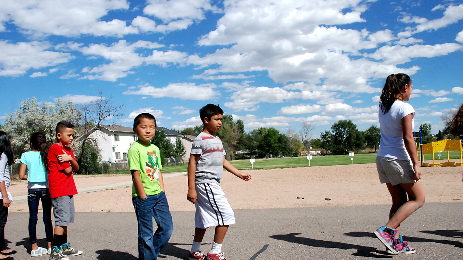 Tennyson Knolls students return to school after a ribbon-cutting ceremony on school grounds in September.