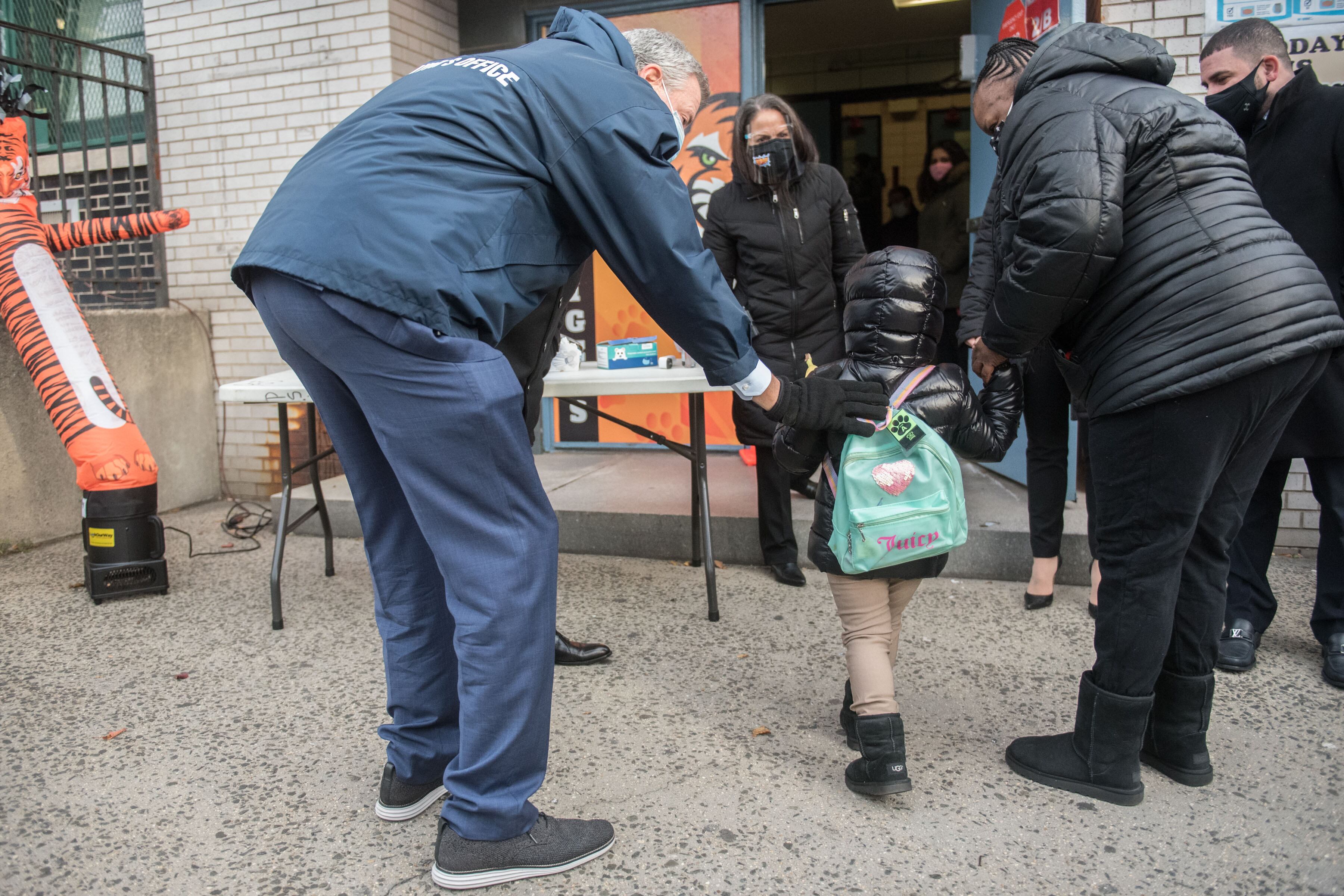 Mayor de Blasio at P.S. 5 Port Morris in the Bronx on Dec. 7, 2020. Only students who consent to COVID-19 testing are allowed to attend in-person classes, and the mayor plans to keep that rule in place.