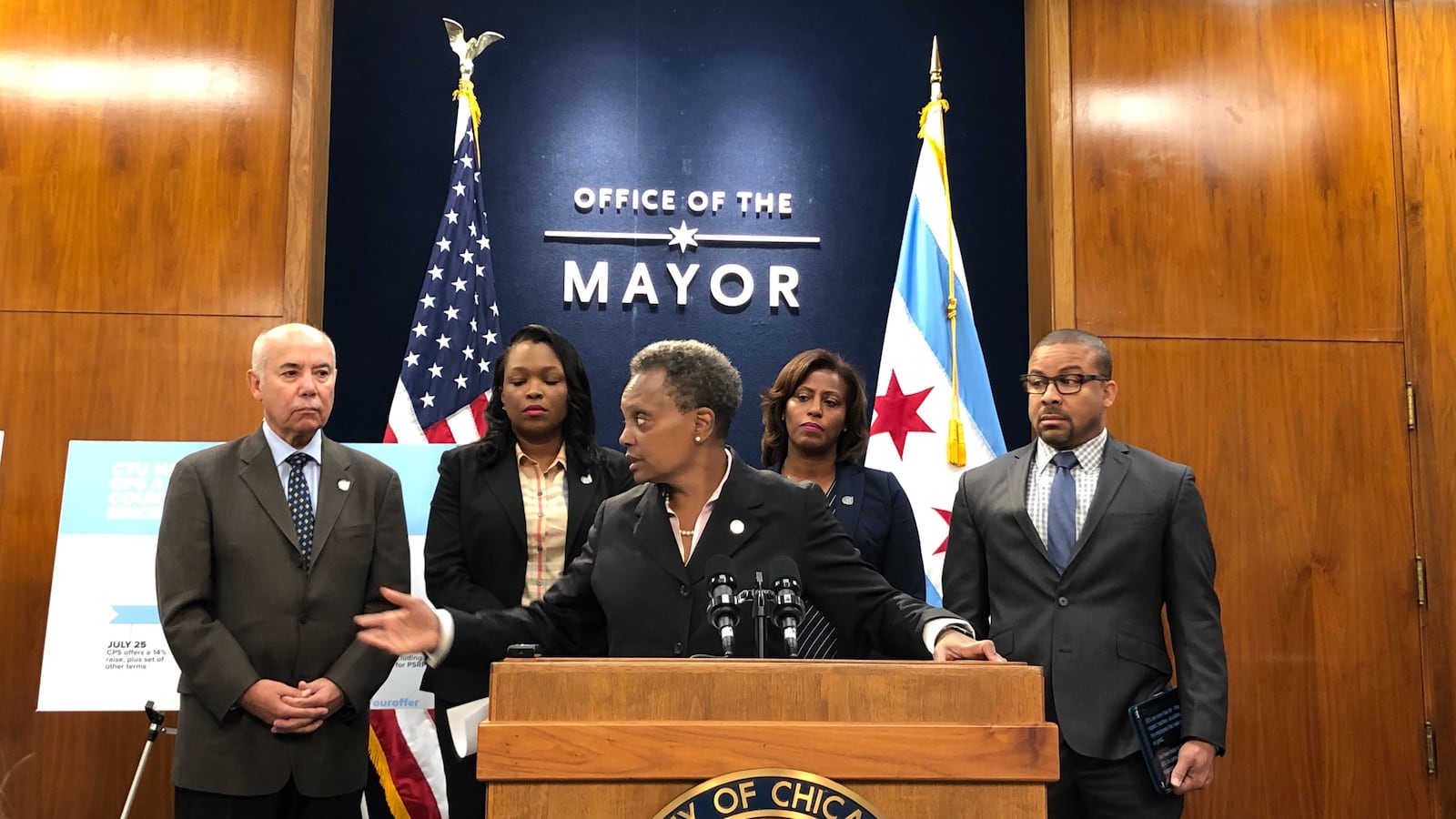 Chicago Mayor Lori Lightfoot discusses teacher contract negotiations on Oct. 7, 2019. Behind her, from left, are Chicago school board President Miguel del Valle, schools chief Janice Jackson, Chief Education Officer LaTanya McDade, and Alderman Michael Scott Jr.