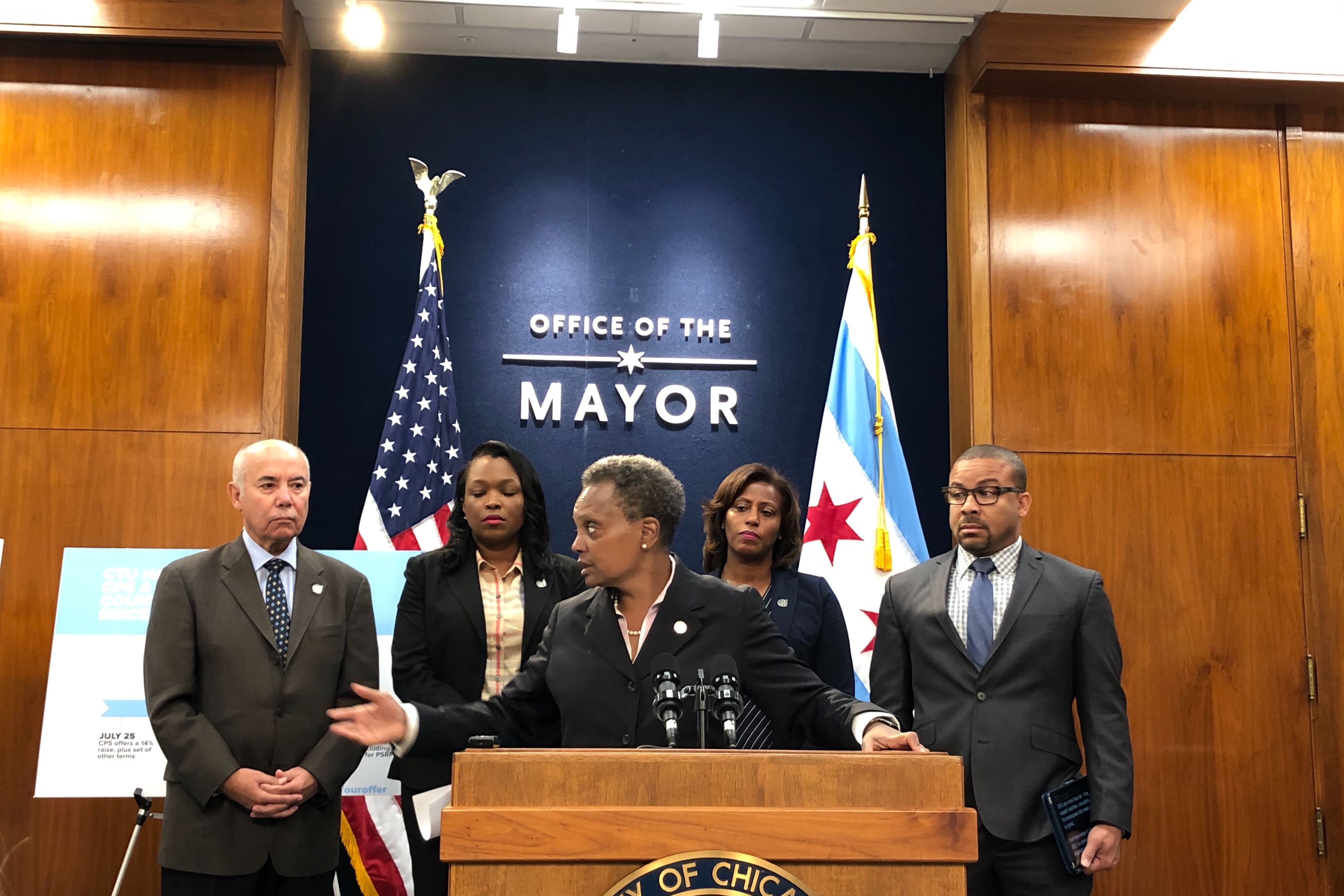 Chicago Mayor Lori Lightfoot discusses teacher contract negotiations on Oct. 7, 2019. Behind her, from left, are Chicago school board President Miguel del Valle, schools chief Janice Jackson, Chief Education Officer LaTanya McDade, and Alderman Michael Scott Jr.