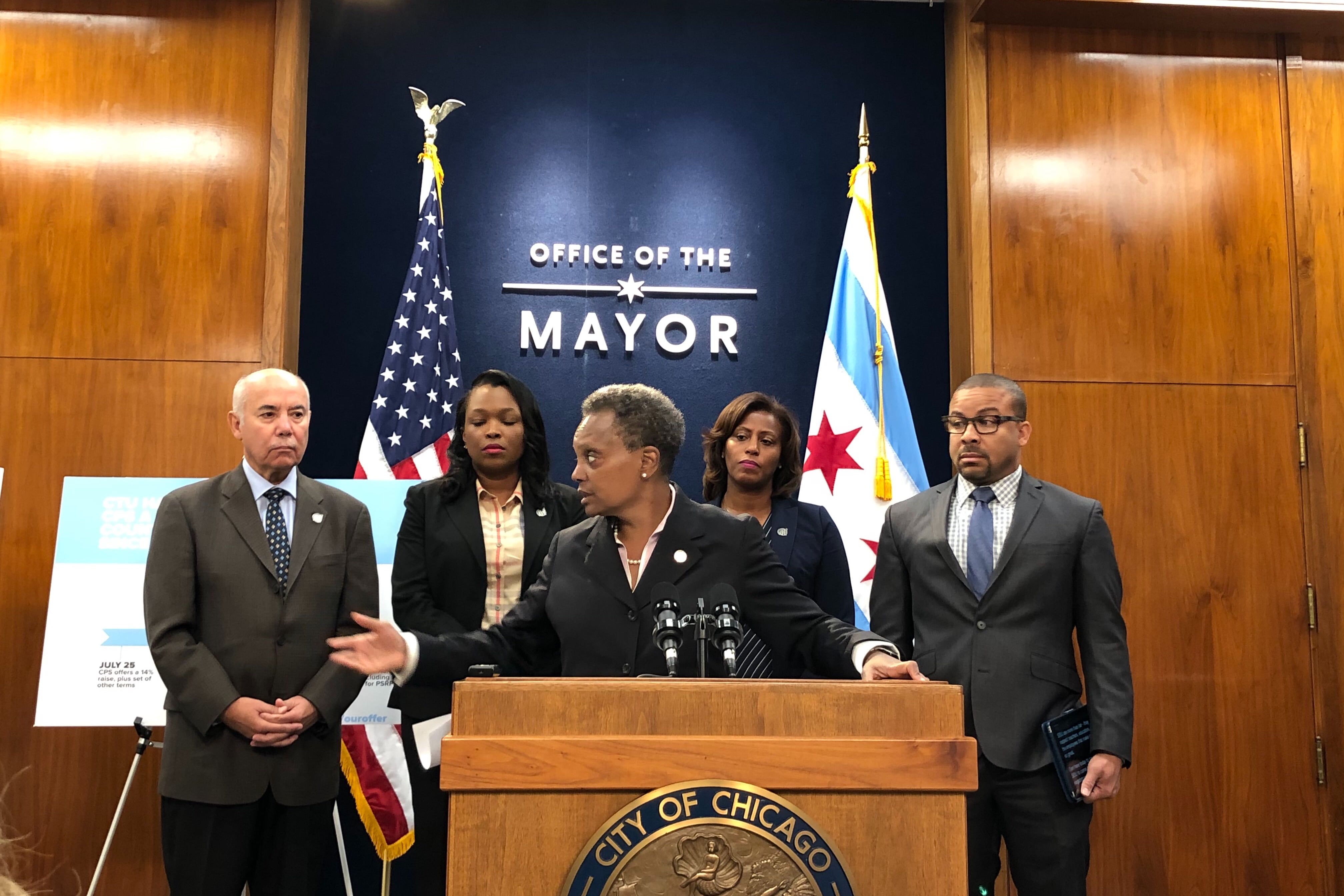 Chicago Mayor Lori Lightfoot discusses teacher contract negotiations on Oct. 7, 2019. Behind her, from left, are Chicago school board President Miguel del Valle, schools chief Janice Jackson, Chief Education Officer LaTanya McDade, and Alderman Michael Scott Jr.