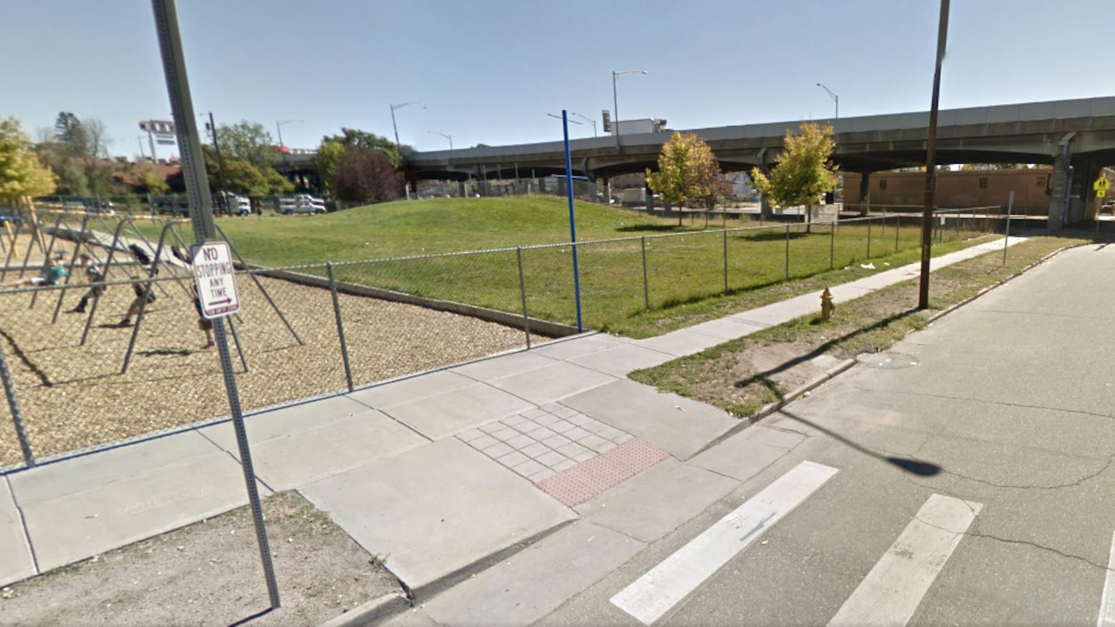Interstate 70 is clearly visible from the playground outside Swansea Elementary School in Denver.