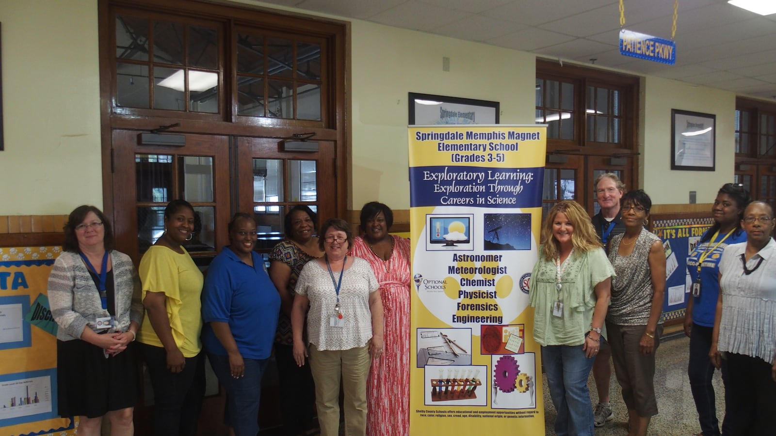 Springdale Elementary School administrators and faculty celebrate after the state Department of Education announces that the Memphis school moved from the state's priority list to its rewards list.