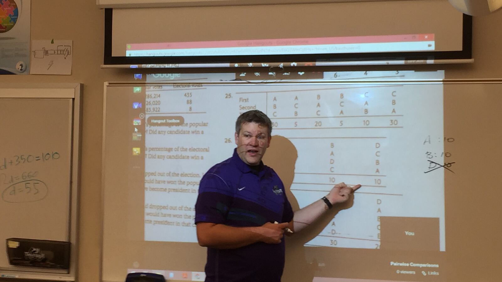 Teacher Jeremy Beckman leads a math lesson at his Colorado Springs school.