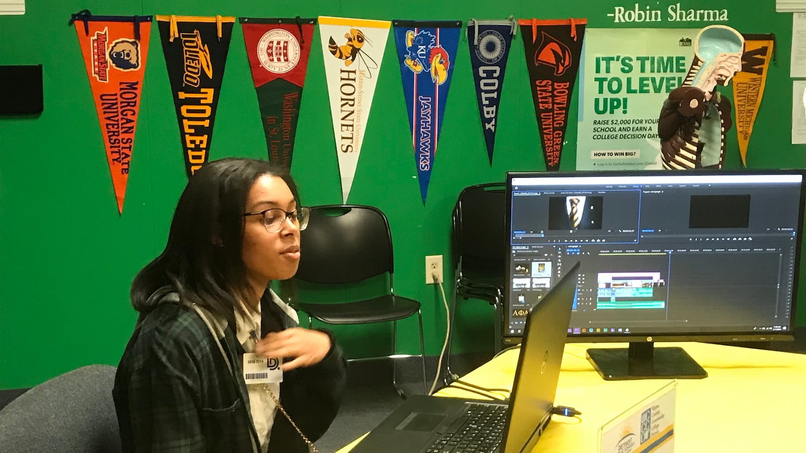 A student from Detroit School of Arts demonstrates using film editing software during a press conference about the Detroit district's efforts to increase career pathways and college dual enrollment courses.