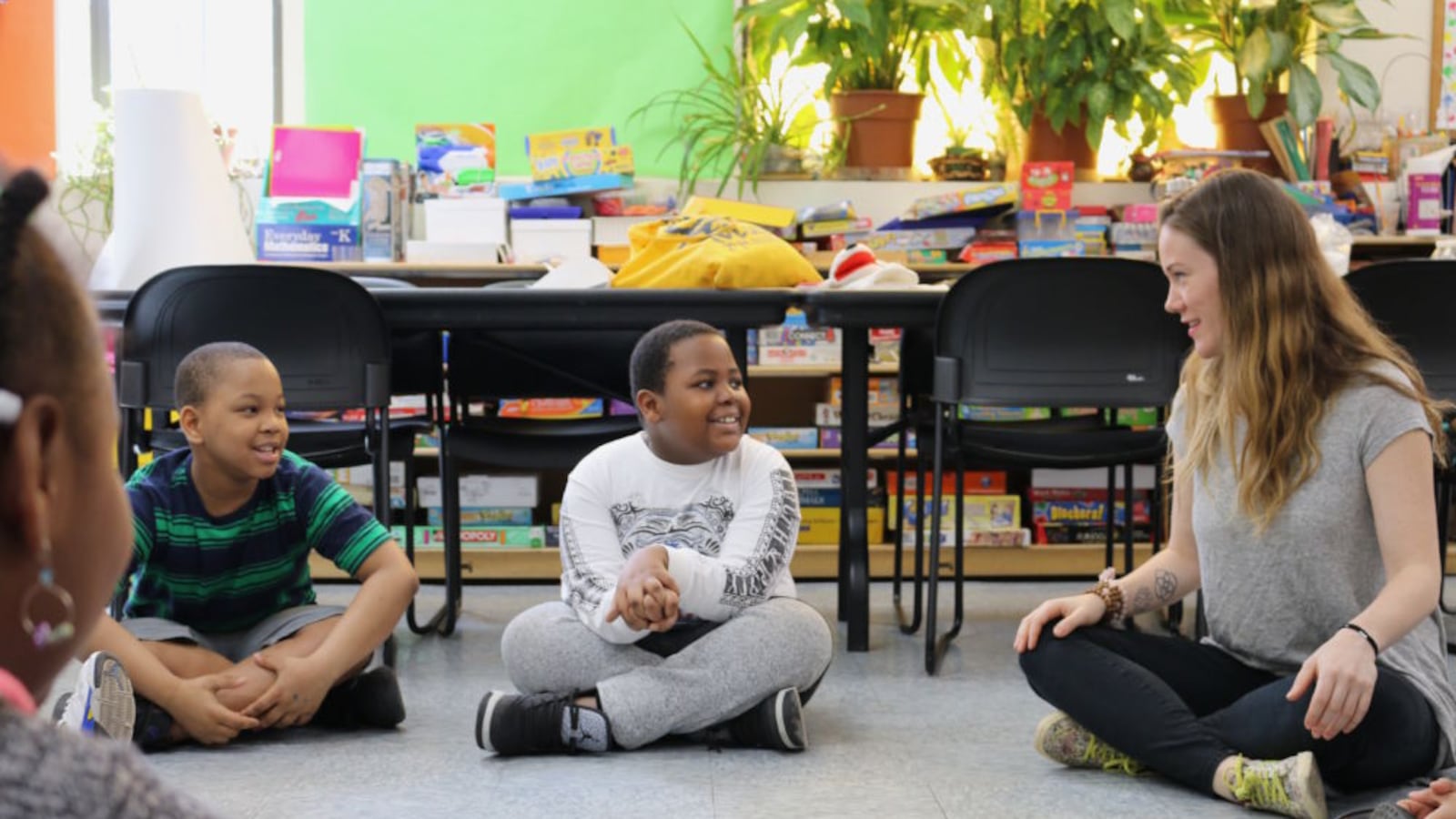 Homeless students participate in an afterschool reading club.